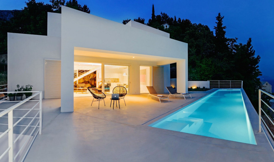 Sun deck area with 27m2 pool, lounge chairs and outdoor furniture