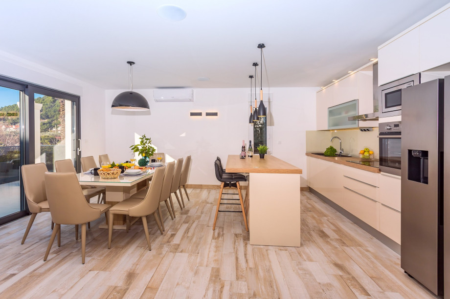 Sun-soaked kitchen area fully equipped with everything
