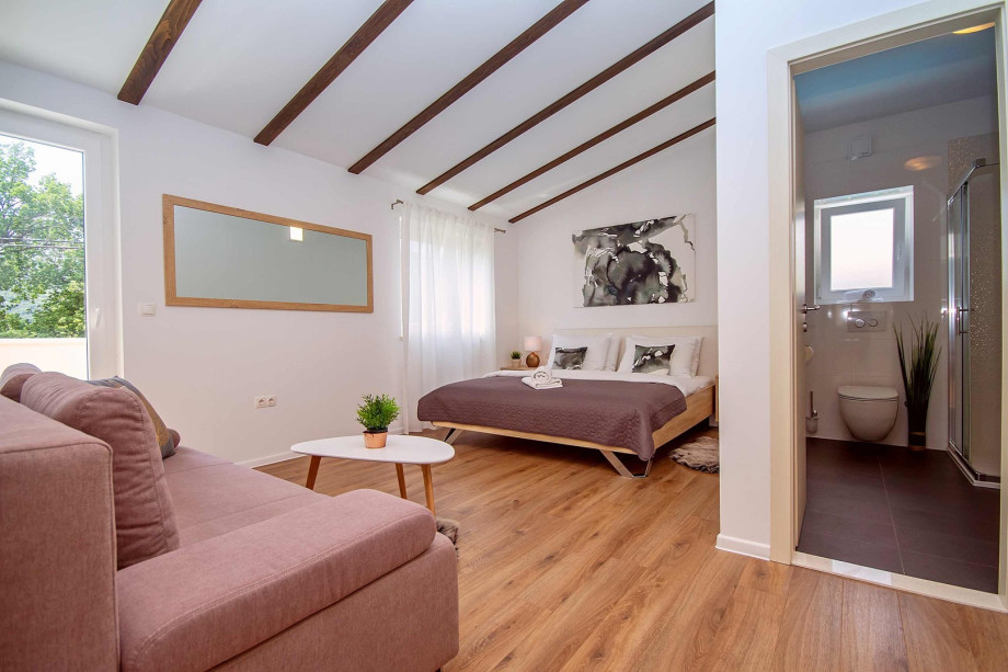 Bedroom NO1 with double bed 180x200 and sofa bed + exit to terrace