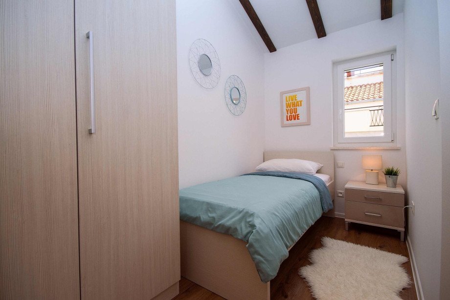 Bedroom NO2 with double bed 180x200 and one single bed in separated part of room