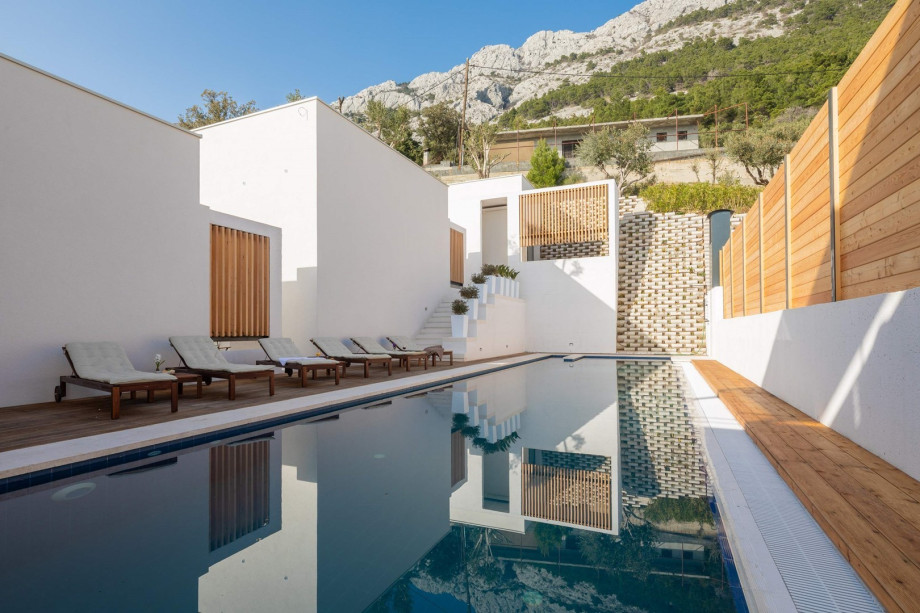 From the sun deck area, you can approach the private terrace of each bedroom where each has a coffee table for two