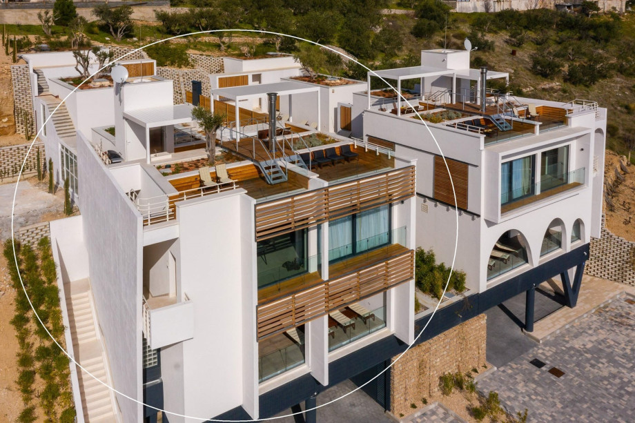 A cozy sitting area with spectacular, elevated views of the Adriatic sea, coast, and islands, together with pool views on the other side