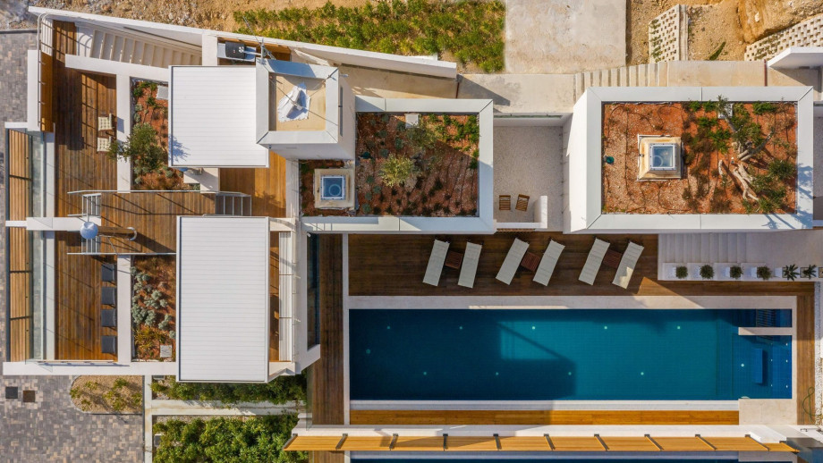 Villa Maestral is settled on a land plot of 861 sqm and offers a total of 556 sqm living space. It has 3 levels connected by staircase and elevator