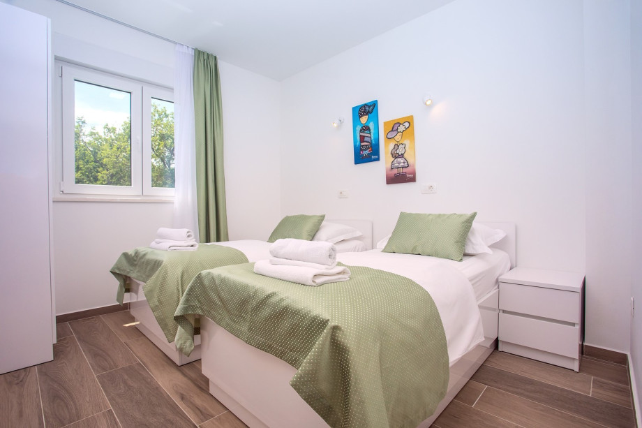 Bright Bedroom Nr.3 with two single beds