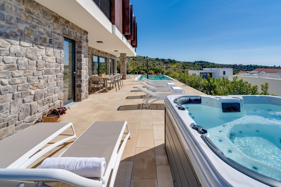 The views from the pool area are on the village and on the sea