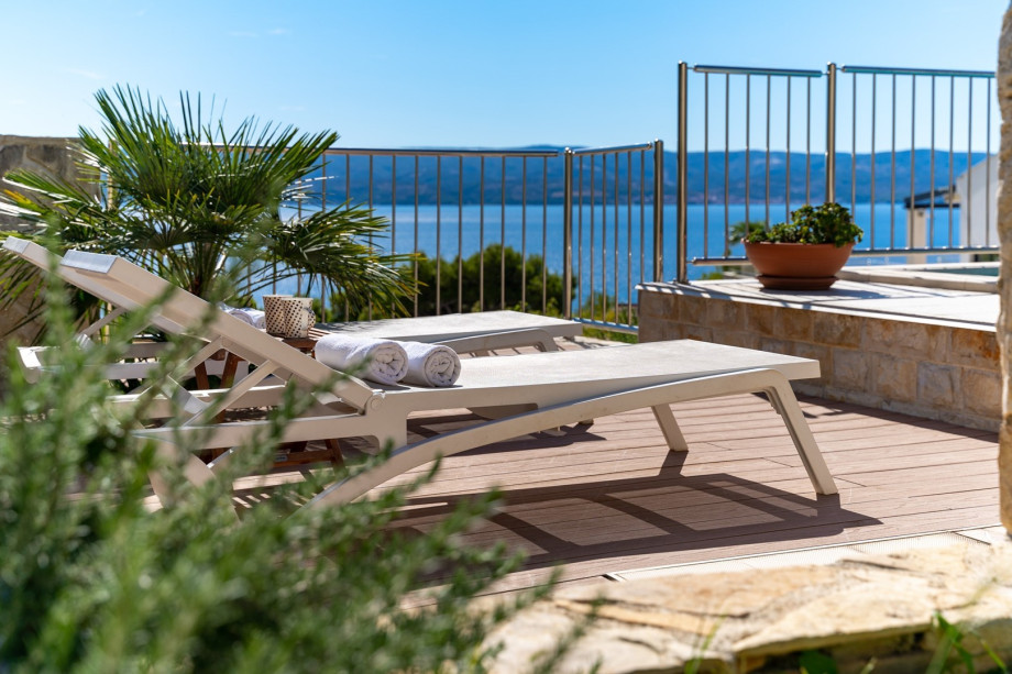 Private heated pool with 8 lounge chairs, sea view