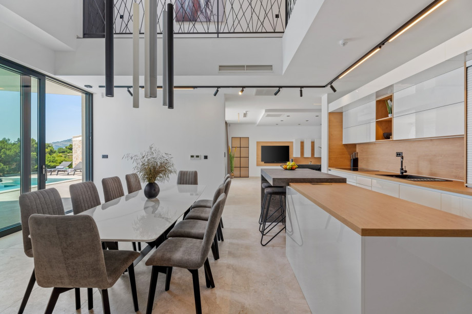 Spacious dining area for 10 pax filled with natural light