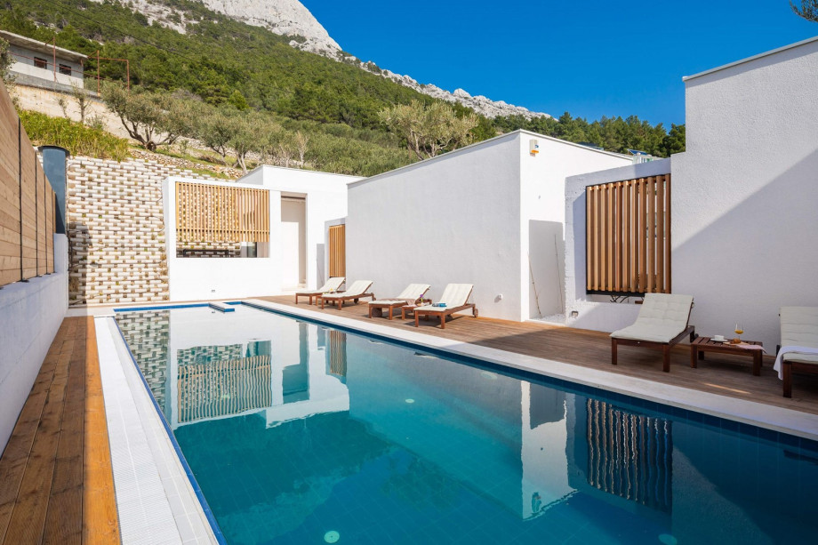 From the sun deck area, you can approach the private terrace of each bedroom where each has a coffee table for two.