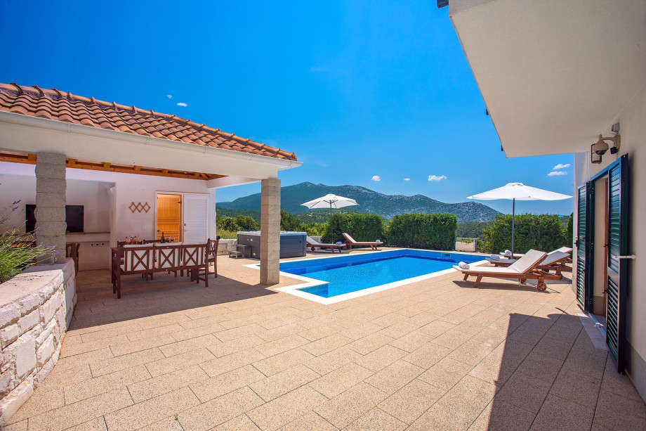 Spacious terrace with lounge and dining area