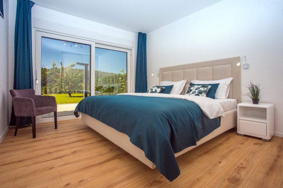 A Bedroom No1 with super-king size bed 200cm x 220cm, A/C, TV, en-suite bathroom