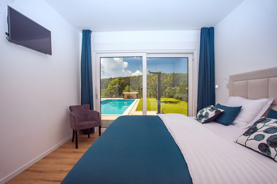 A Bedroom No1 with super-king size bed 200cm x 220cm, A/C, TV, en-suite bathroom