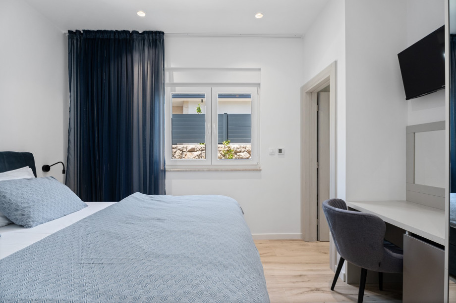 Bedroom No.2 also offers an en-suite bathroom with a refreshing shower, a TV, A/C,