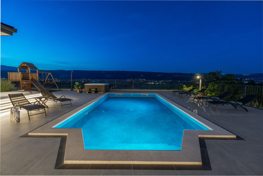 A private 8m x 4m swimming pool