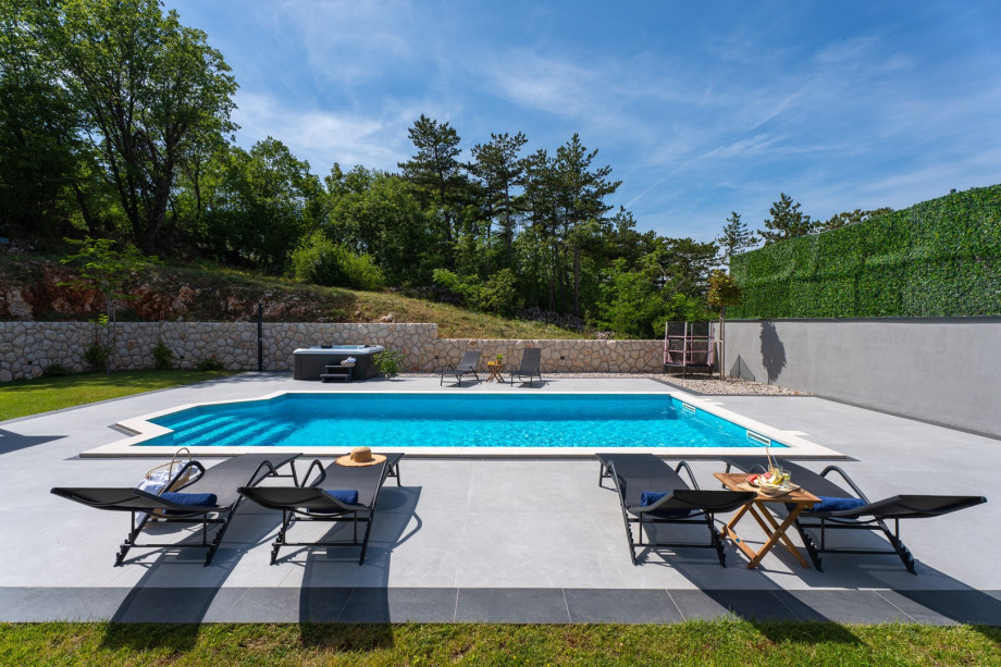 A private 8m x 4m swimming pool