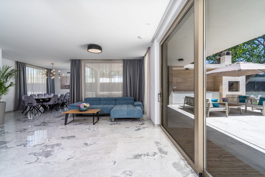 A separate toilet on the ground floor and a Laundry with a washing machine, dryer, and iron