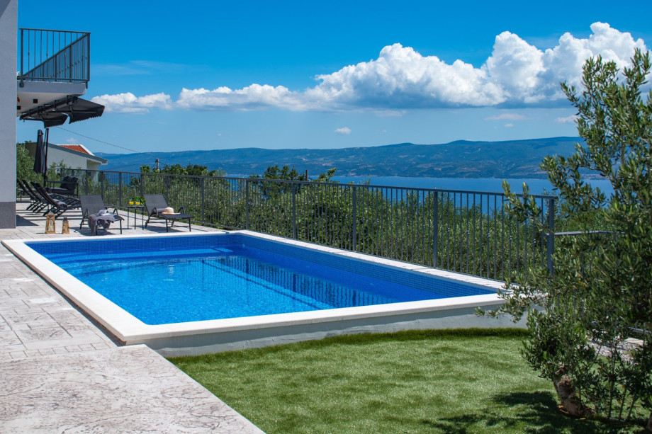 The ideal location for enjoyment in a cozy and pristine setting, offering breathtaking views of the sea and islands