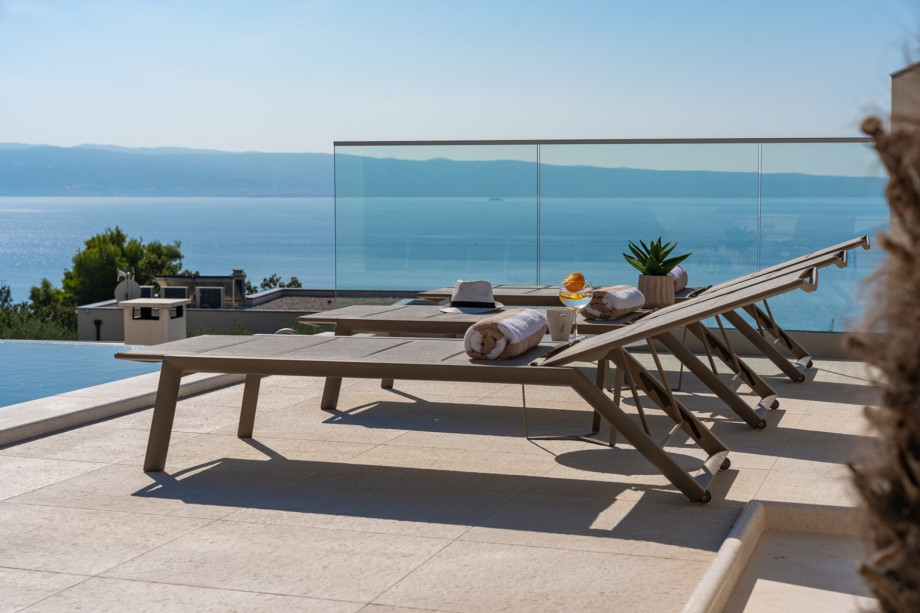 Sun deck area with deck chairs, with sea view