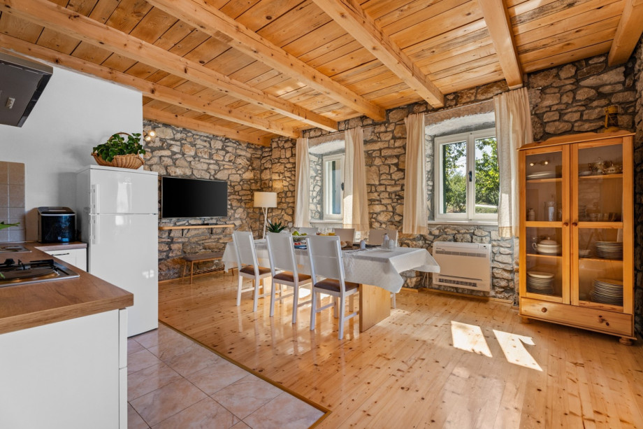 The First floor offers a spacious and air conditioned living area with a fully equipped kitchen