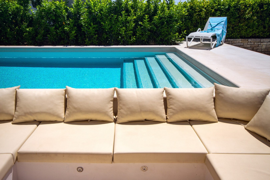 Comfortable lounge sitting area attached to the pool