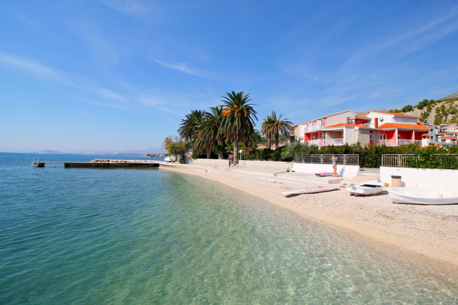 Beautiful beach with the clean and warm sea in front of Villa Amor