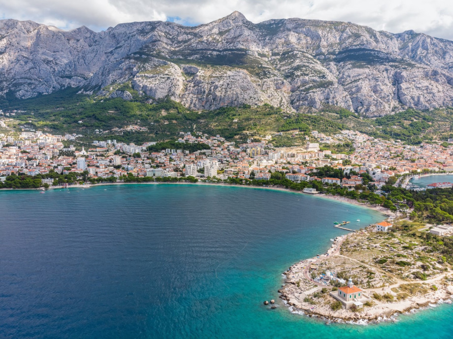 Makarska (10 km) is a prominent regional tourist center, located on a horseshoe-shaped bay between the Biokovo mountains and the Adriatic Sea.