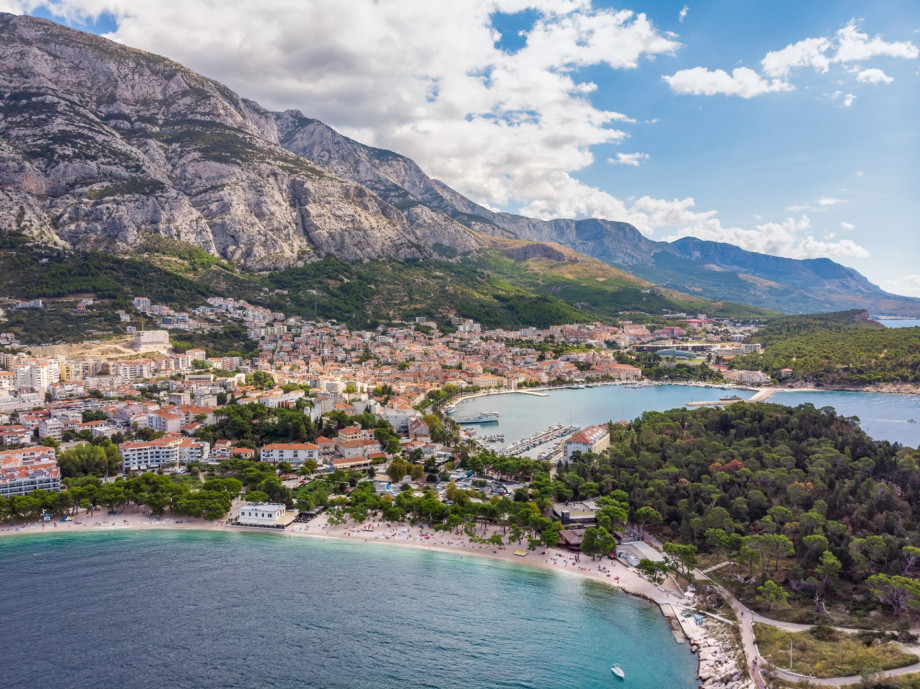 Makarska is noted for its palm-fringed promenade, where cafes, bars and boutiques overlook the harbor