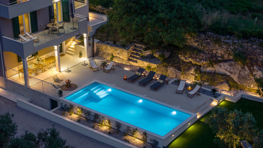 This exquisite 6-bedroom villa offers the epitome of luxury and relaxation