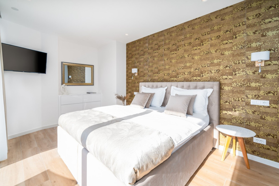 There is a spacious terrace with deck chairs used by this bedroom only. .