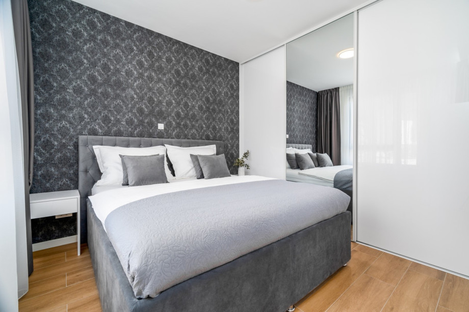 Bedroom No4 (North-West) with a king-size bed 180cm x 200cm.