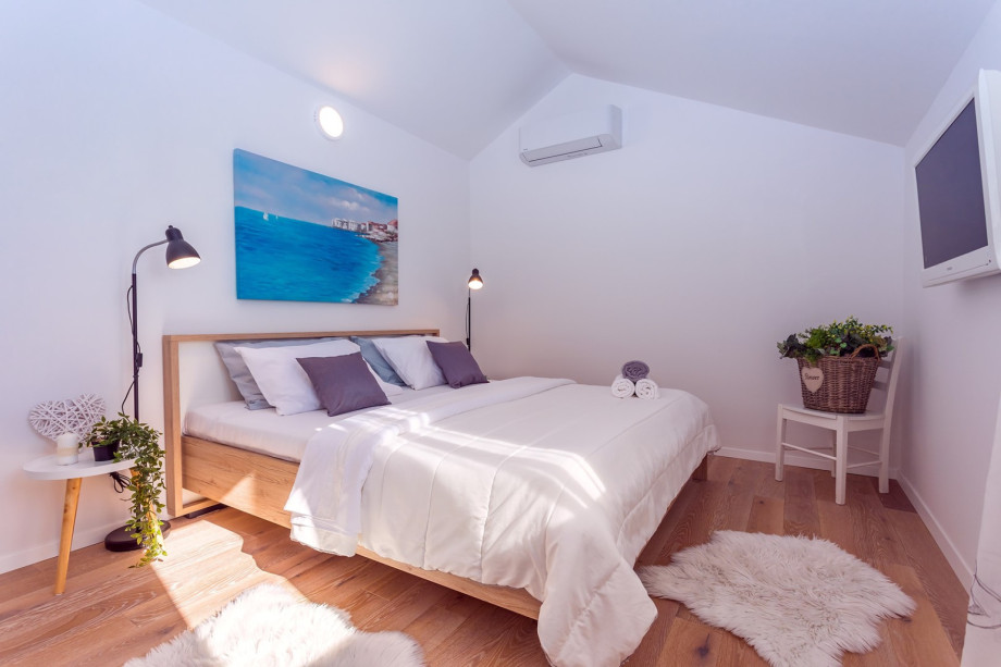 Bedroom No1 with king-size bed 180cm x 200cm, AC and a TV