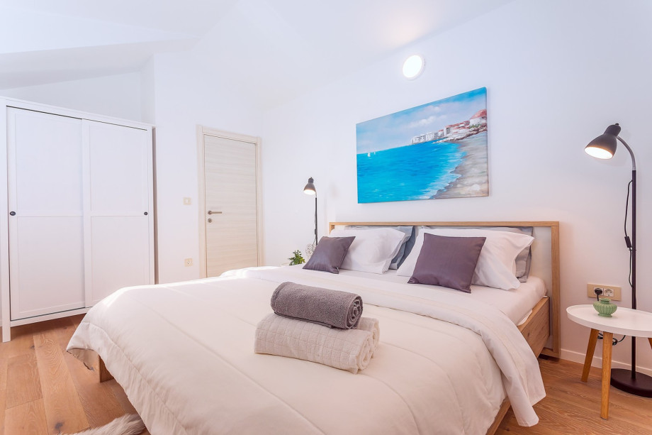 Bedroom No1 with king-size bed 180cm x 200cm, AC and a TV