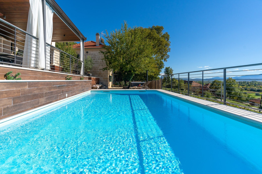 Villa Little Arya with heated pool, hot tub, and 4 bedrooms.