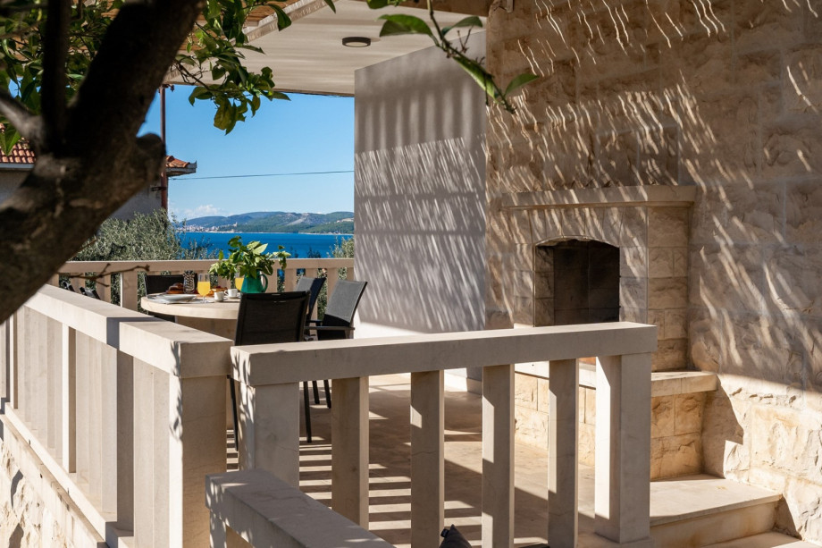 Covered outdoor dining area for pleasant meals.