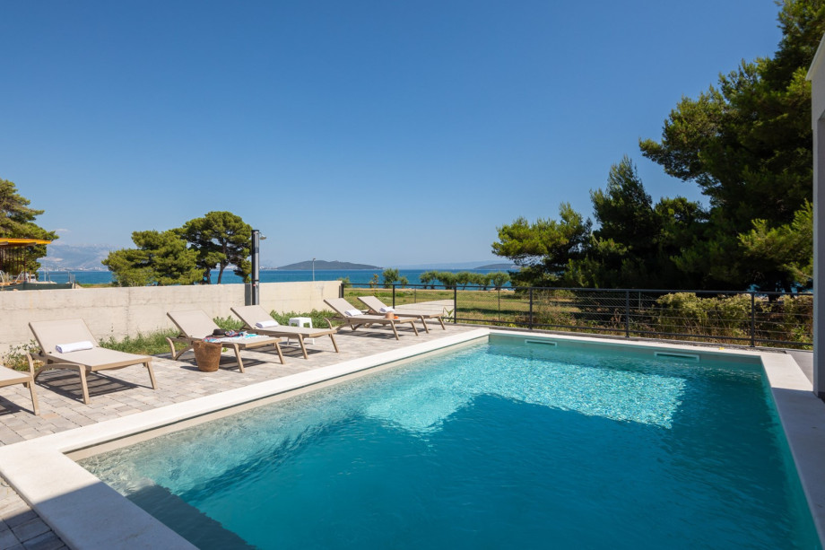 Soak up the sun on the deck equipped with six lounge chairs