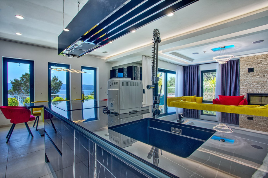There is also a fully equipped and very modern kitchen with an island