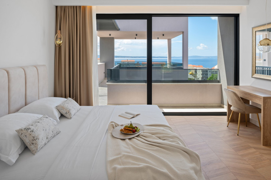 En-suite bedrooms, each with air conditioning,  and stunning sea views