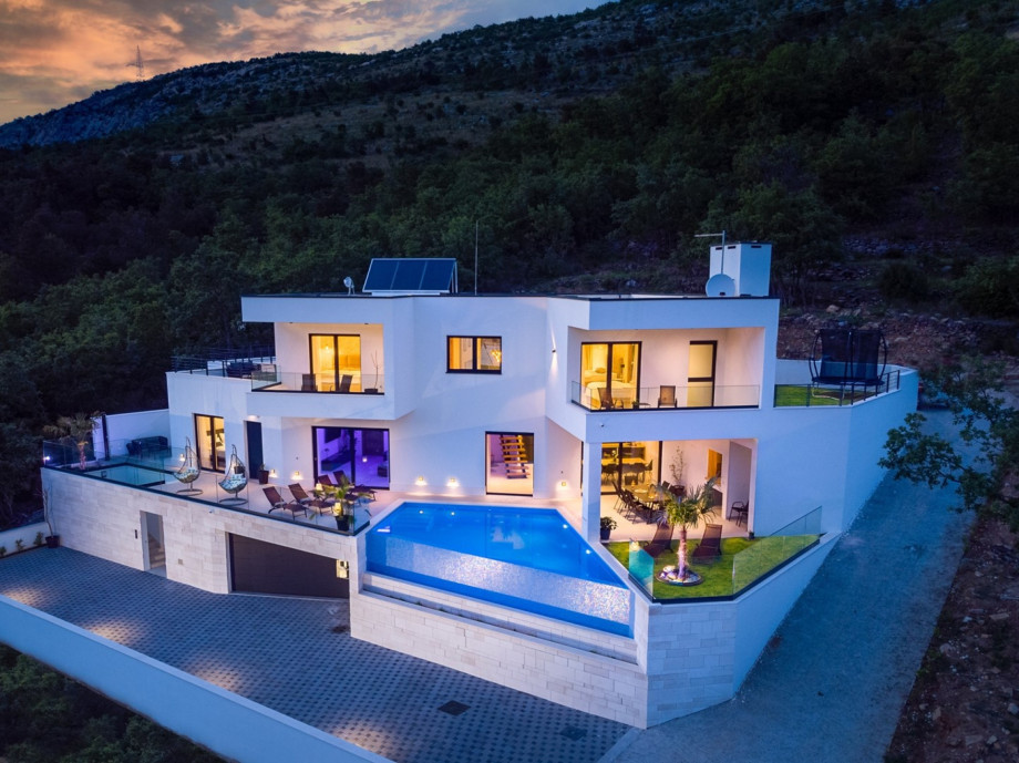 The whole property is fully fenced, and there are 3 parking places on the private plot