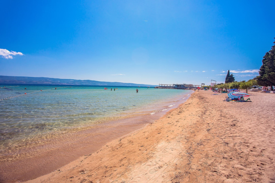 Beautiful sandy beach in Duće is only 8 km far