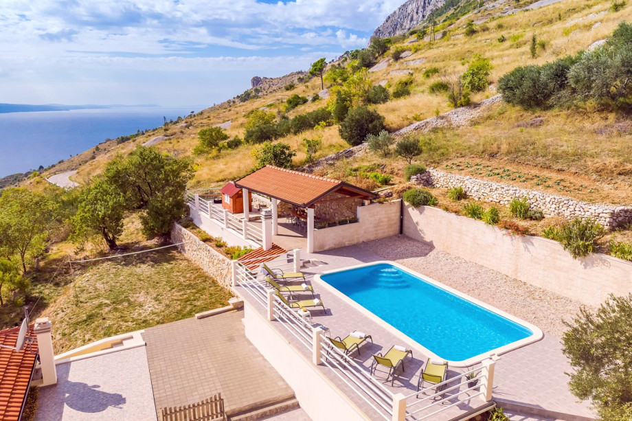 Villa offers a comfortable outside area with different areas