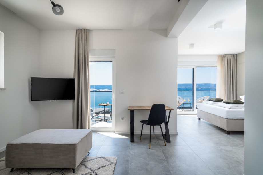 The Second floor offers a master bedroom No1 consist two balconies with panoramic views on the coast, sea and islands
